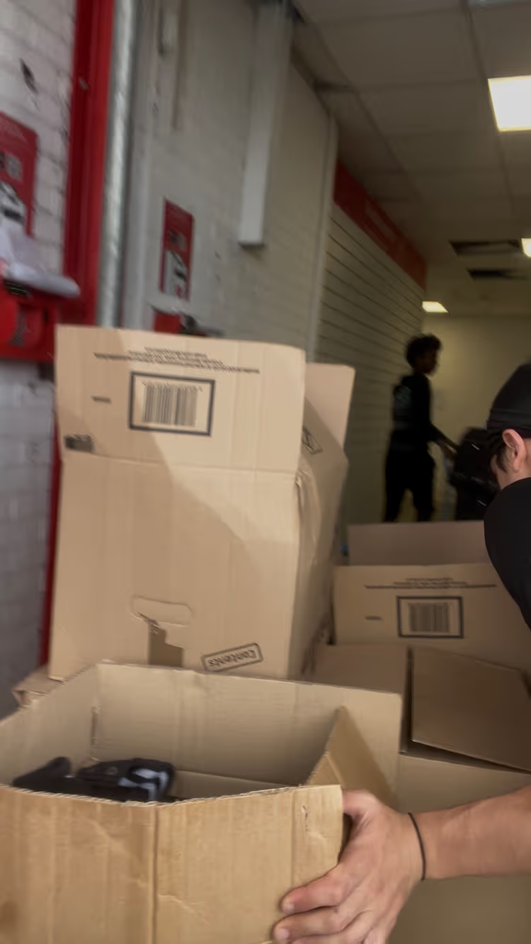 Team members working in professional storage facility