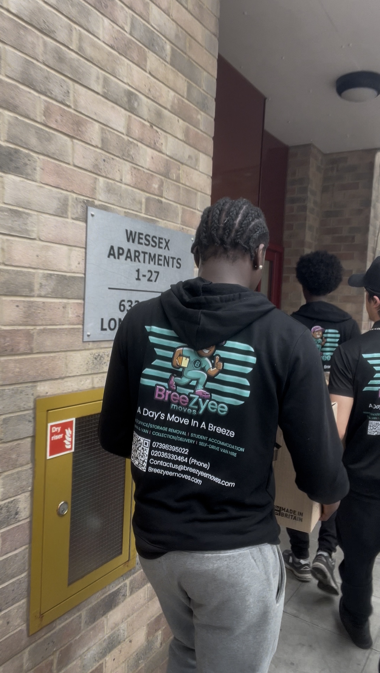 Team at Wessex Apartments with clear branding